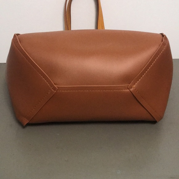 Tommy Bahama Reversible Faux Leather Tote Wristlet - Picture 10 of 16